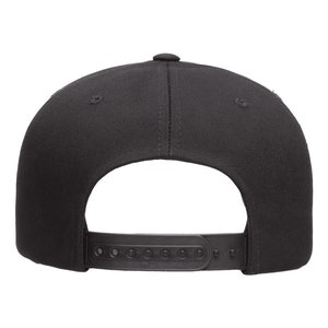 May include: A black baseball cap with a black adjustable strap in the back.