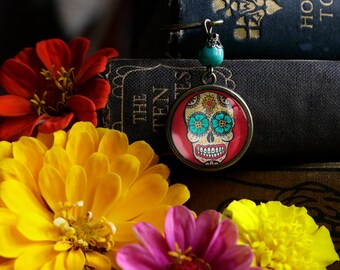 Sugar Skull with Blue Eyes Glass Cabochon Day of the Dead Brass Book Hook / Bookmark