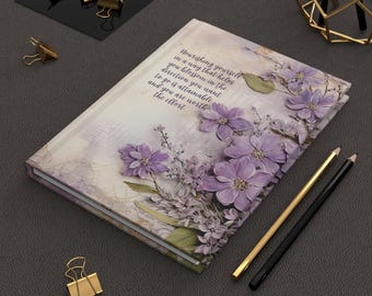 May include: A purple floral design journal with the text "Nourishing yourself in a way that helps you blossom in the direction you want to go is attainable, and you are worth the effort."