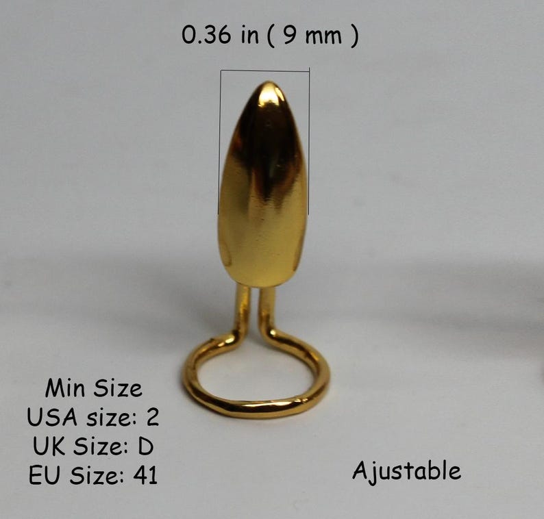 May include: Gold-colored adjustable ring with a pointed top. The ring is 0.36 inches (9 mm) tall. The minimum size is USA size 2, UK size D, and EU size 41.