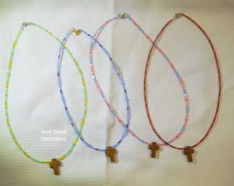 Love Bead Necklaces, chokers in 3 lengths, multiple colors, with wood cross.