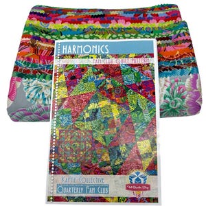 May include: A stack of colorful fabric strips featuring various floral and geometric patterns in shades of pink, green, blue, and orange, paired with a Harmonics Fan Club Quilt Pattern booklet from the Kaffe Collective Quarterly Fan Club.