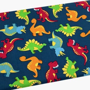 Dinosaurs on Navy Blue Fabric by the Yard, Orange Dino, Quilting Cotton, B6.33