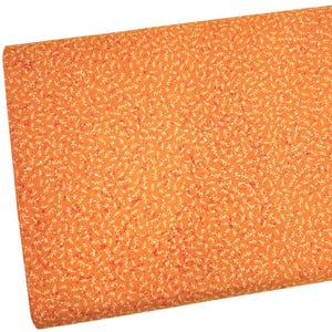 May include: Orange fabric with a white leaf pattern. The fabric has a subtle texture and a slightly distressed look.