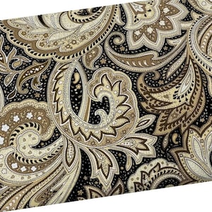 May include: A black fabric with a paisley pattern in shades of brown and beige. The pattern is intricate and features a variety of shapes and sizes.