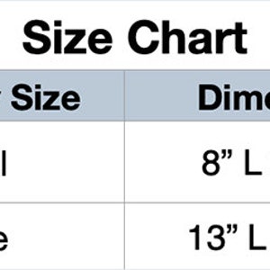 May include: Size chart for bone toys, showing dimensions. Small size is 20.3 cm long and 11.4 cm tall. Large size is 33 cm long and 19 cm tall. The chart includes the text "Bone Toy Size" and "Dimensions".