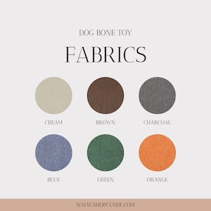 May include: Image displaying fabric swatches for dog bone toys. The swatches are arranged in a grid, with the colours cream, brown, and charcoal on the top row, and blue, green, and orange on the bottom row. The word "FABRICS" is displayed in large text.