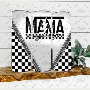 May include: A set of three stainless steel tumblers. Each tumbler features a design with the word "MAMA" in bold black letters, a lightning bolt, and a skateboard. The design includes a black and white checkered pattern and a silver glitter stripe.