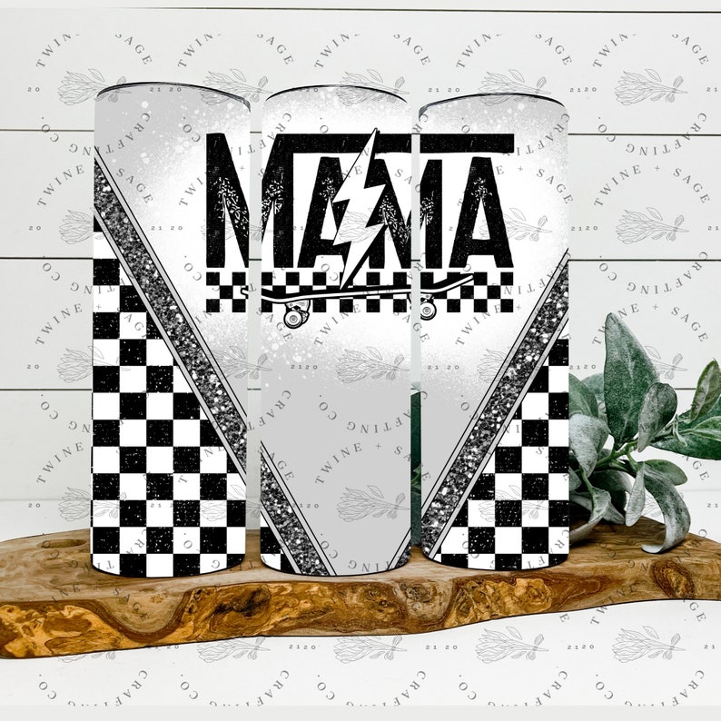 May include: A set of three stainless steel tumblers. Each tumbler features a design with the word "MAMA" in bold black letters, a lightning bolt, and a skateboard. The design includes a black and white checkered pattern and a silver glitter stripe.