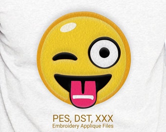 May include: Yellow embroidered emoticon with a winking eye, a large white eye, and a pink tongue sticking out. The text "PES, DST, XXX Embroidery Applique Files" is below the emoticon.