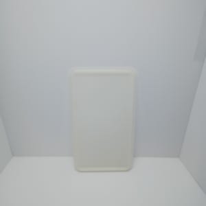 May include: A rectangular, off-white tray with rounded corners and a slightly raised edge. The tray features a smooth, solid-colored surface and a simple, functional design, presented in a clean, neutral tone without any additional patterns or markings.