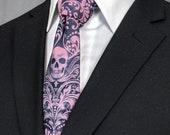 Rose Skull Necktie – Light Pink Skull Tie. Fabric has natural color variations. Greys blend into the Pink Skulls.