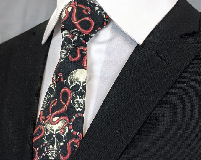 Skull and Snake Necktie – This Skull and Snake Neck Tie is available as a Extra Long Tie and A Skinny Necktie.