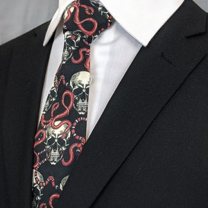 Skull and Snake Necktie – This Skull and Snake Neck Tie is available as a Extra Long Tie and A Skinny Necktie.