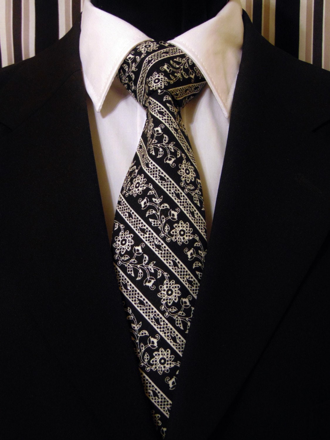 black tie with white stripe