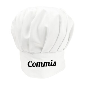 May include: White chef hat with the word "Commis" embroidered in black on the band.