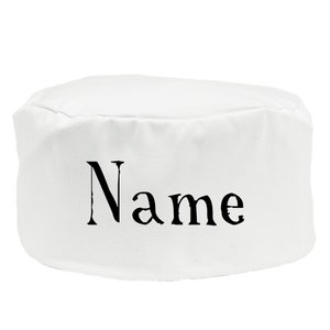 May include: White chef's hat with the word "Name" printed in black.