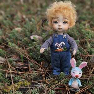 Ooak Art doll sculpted clay doll, Doll with Bunny Toy