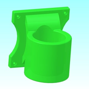 Puede incluir: Un soporte de pared de pl&aacute;stico verde brillante con una taza cil&iacute;ndrica para sujetar objetos. El soporte tiene dos agujeros para tornillos en la parte posterior.