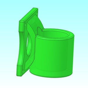 Puede incluir: Un soporte de pared de pl&aacute;stico verde para un ventilador. El soporte tiene una abertura circular para el ventilador y una base rectangular para montarlo en una pared.