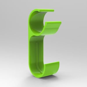 May include: A bright green plastic hook with two loops. The hook is designed to hold items like cords or cables.