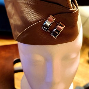 Vintage female army sharp shooter uniform.
