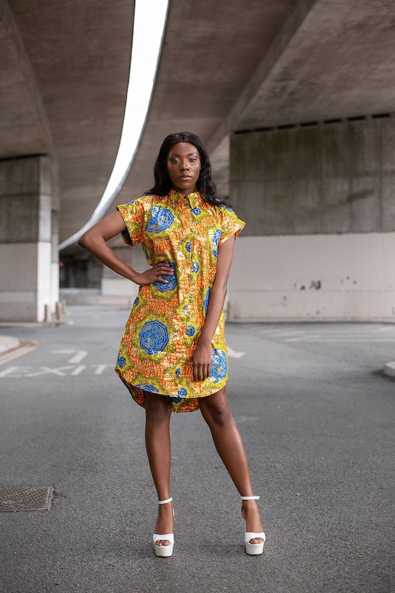 Belle robe africaine en or m tallique scintillant Robe azt que