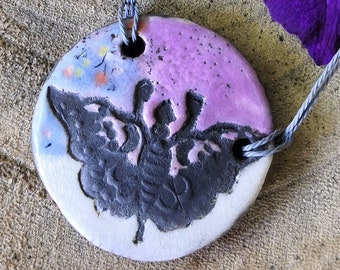 CHAKRA round ceramic raku necklace, nature-inspired jewelry, natural jewelry, purple enamel and white butterfly pattern