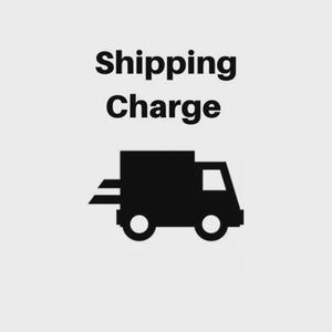 May include: Black silhouette of a delivery truck with the words "Shipping Charge" above it. The truck has two wheels and a rectangular cargo area. The background is a light gray color.