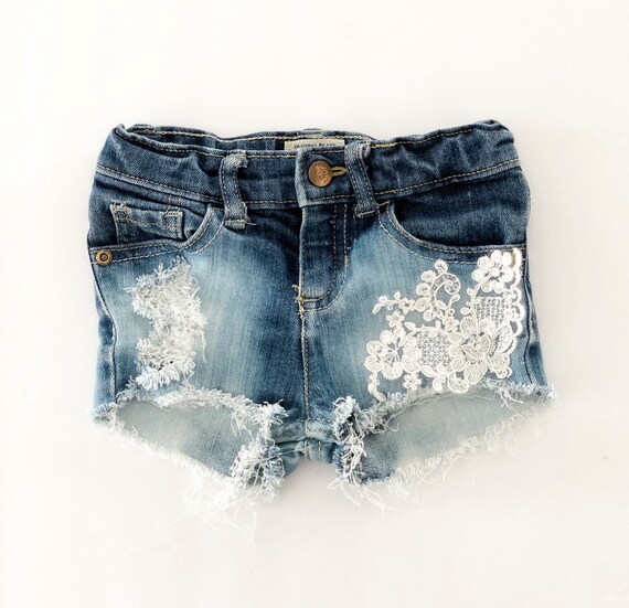distressed fringe shorts