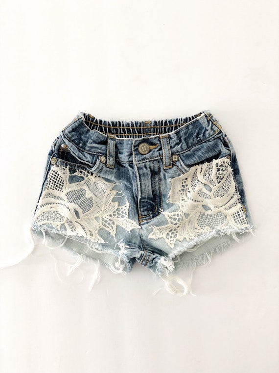 girls distressed shorts