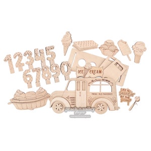 May include: Wooden craft kit featuring a vintage ice cream truck with a sign that reads "ICE CREAM The Creamery", a scoop of ice cream, and a banner that says "Life is Sweeter by the Scoop". The kit also includes numbers 1-9, a waffle cone, a popsicle, and a bowl of ice cream.
