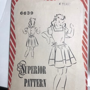 May include: A vintage sewing pattern for a girl's dress. The pattern is for a 4-year-old and is from the Superior Pattern company. The pattern number is 6639.
