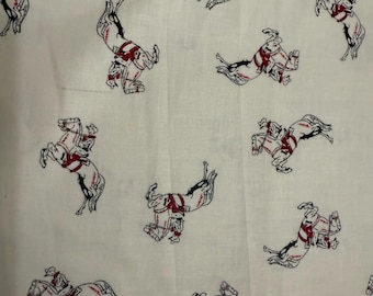 Cowboy - Cowboy à cheval sur un tissu imprimé sur fond crème par Echo Park paper Co pour Riley, Blake designs/ Vendu par demi-mètre