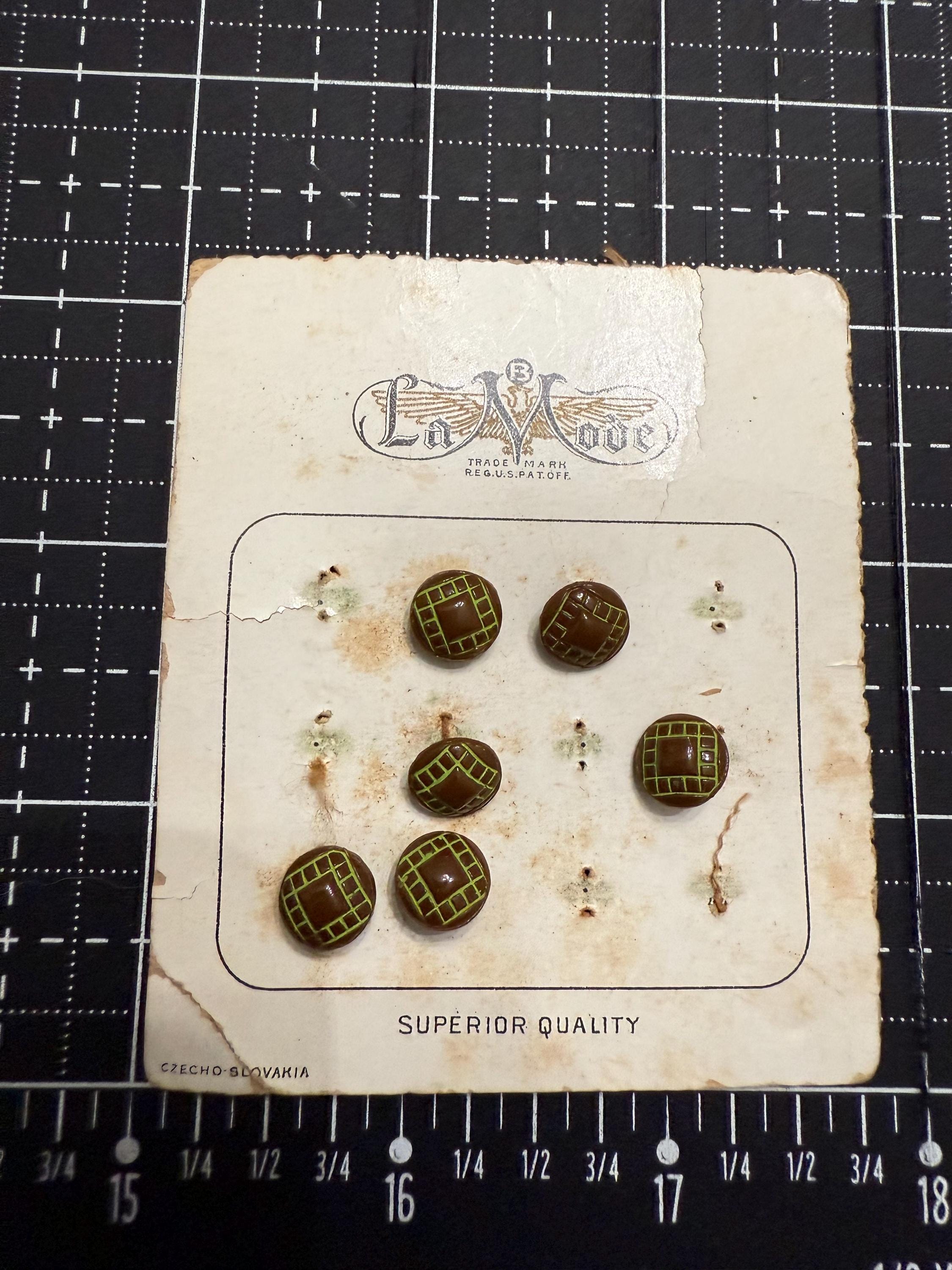 1920’s La Mode Buttons hand painted green @ Brown enamel buttons with  inlays on a card made in Czechoslovakia