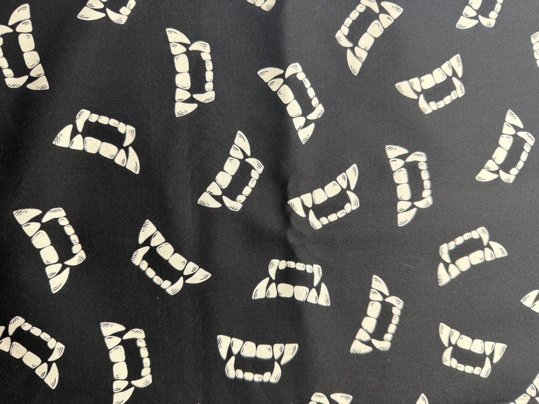 Vampire Fangs Rug Vampire Glow- White Fangs on Black Background by Timeless Treasures ...