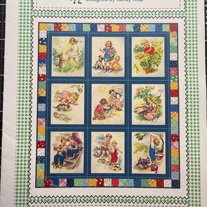 May include: A sewing pattern titled American Jane Patterns Designed by Sandy Klop and Plain & Simple 545. The cover features a grid of nine illustrations depicting children and pets in outdoor settings, framed by a colorful patchwork border.