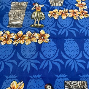 Island Breeze - tropical Tikis and hula girls on a dark blue background:Cotton/ Sold by the half yard