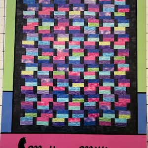 May include: A colorful quilt pattern titled "Bookend" with a geometric design of rectangular blocks in shades of pink, blue, purple, and yellow. The design is by Melissa Milligan for Villa Rosa Designs. The background is black.