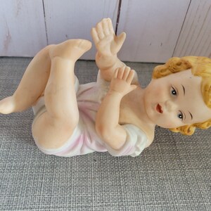 Bisque Porcelain Piano Baby, Blonde Blue Eyed, Nursery Décor, On Back Position,  Baby Figurine