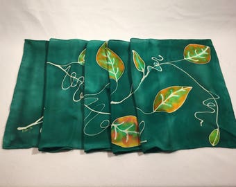 Green silk scarf with autumn leaves