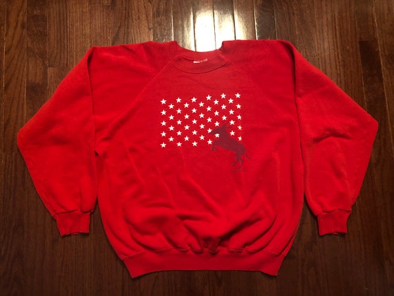 red sweatshirt with white stars