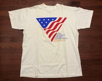 XL 1991 Operation Desert Storm T shirt men's white blue red American flag National Victory Celebration 90's vintage 1990's Delta E