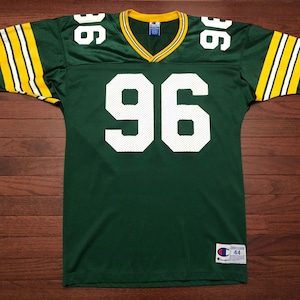 Large 1994 Green Bay Packers football jersey Sean Jones men&#39;s size 44 vintage 90&#39;s Champion green gold white 1990&#39;s E