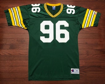 Large 1994 Green Bay Packers football jersey Sean Jones men's size 44 vintage 90's Champion green gold white 1990's E
