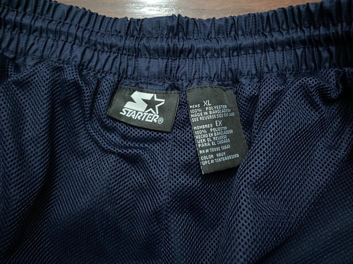 swishy track pants