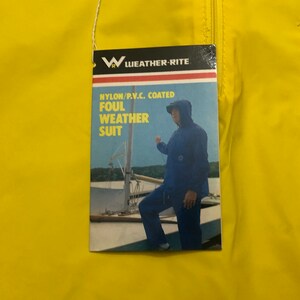 May include: A yellow nylon foul weather suit with a zipper closure and a patch pocket. The tag reads "Weather-Rite" and "Nylon/P.V.C. Coated Foul Weather Suit".