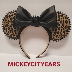 Leopard Punk studded ears.