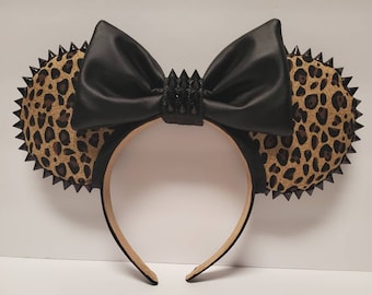 Leopard Punk studded ears.