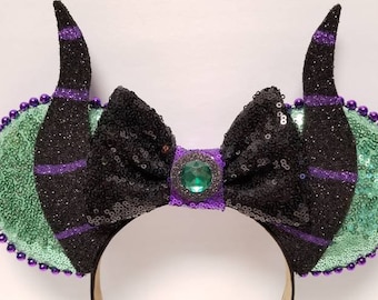 Maleficent inspired ears.    TRIM options available